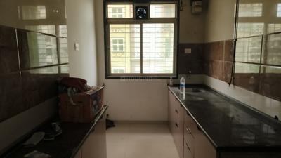Kitchen Image of 1050 Sq.ft 2 BHK Apartment / Flat for rent in Thakurli Thane for Rs. 25000
