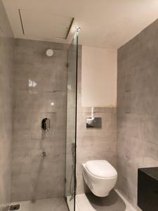 Common Bathroom Image of 750 Sq.ft 2 BHK Apartment / Flat for sale in Hubtown Rising City, Ramabai Ambedkar Nagar Mumbai for Rs. 17000000