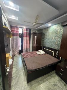 Bedroom Image of 1000 Sq.ft 3 BHK Builder Floor for rent in Sector 22 Rohini New Delhi for Rs. 24000