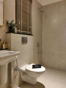 Common Bathroom One Image of 950 Sq.ft 2 BHK Apartment / Flat for sale in Rustomjee La Familia, Thane West Thane for Rs. 15000000