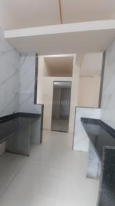 Kitchen Image of 670 Sq.ft 1 BHK Apartment / Flat for sale in Mohan Alcoves I, Badlapur West Badlapur for Rs. 2699000