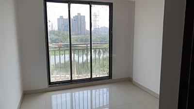 Bedroom Image of 550 Sq.ft 1 BHK Apartment / Flat for sale in Laxmi Aangan Mahanadi Krishna And Ganga, Diva Thane for Rs. 3000000