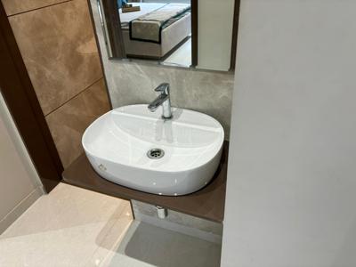 Bathroom Image of 1100 Sq.ft 2 BHK Apartment / Flat for sale in Mangalam Melizma, Kiwale Pune for Rs. 5800000
