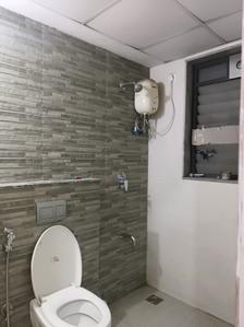 Common Bathroom Image of 729 Sq.ft 1 BHK Apartment / Flat for rent in Lodha Palava Downtown, Palava Phase 2 Thane for Rs. 12500