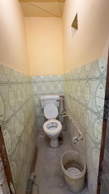 Bathroom Image of 225 Sq.ft 1 RK Independent House for sale in Nawada New Delhi for Rs. 3100000