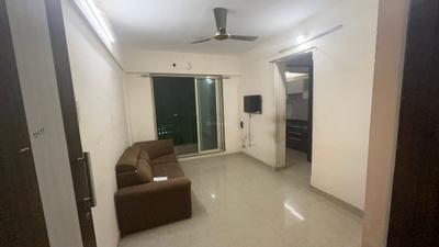 Living Room Image of 660 Sq.ft 1 BHK Apartment / Flat for rent in Mohan Willows, Badlapur East Badlapur for Rs. 8500