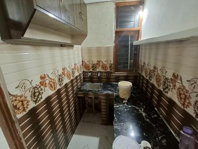 Kitchen Image of 585 Sq.ft 2 BHK Builder Floor for rent in Khirki Extension New Delhi for Rs. 14000