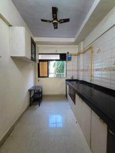 Kitchen Image of 860 Sq.ft 2 BHK Apartment / Flat for sale in Rajhans Dreams, Vasai West Vasai for Rs. 8200000