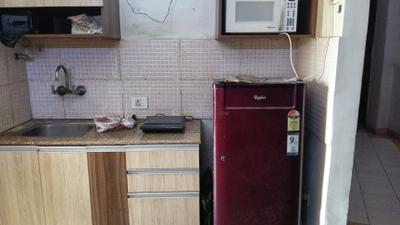 Kitchen Image of 440 Sq.ft 1 RK Studio for rent in Supertech Eco Suites, Sector 137 Noida for Rs. 20000