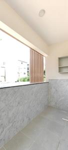 Balcony Image of 1250 Sq.ft 1 BHK Apartment / Flat for rent in Singasandra Bengaluru for Rs. 38500