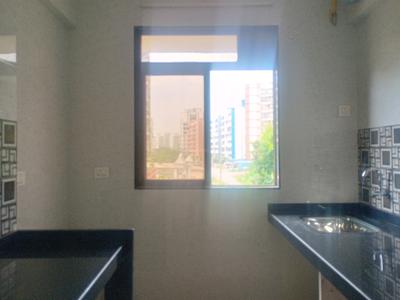 Kitchen Image of 659 Sq.ft 1 BHK Apartment / Flat for sale in Amrut Laxmi Raj Regalia Phase I, Ambernath East Ambernath for Rs. 2350000