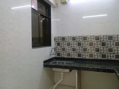 Kitchen Image of 930 Sq.ft 1.5 BHK Apartment / Flat for sale in Nisarg Greens, Ambernath East Ambernath for Rs. 5000000