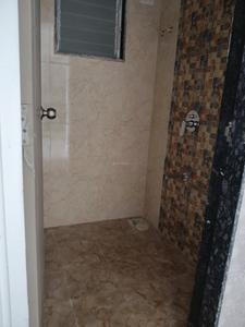 Common Bathroom Image of 680 Sq.ft 1 BHK Apartment / Flat for sale in Pushpak Nagar Navi Mumbai for Rs. 4300000