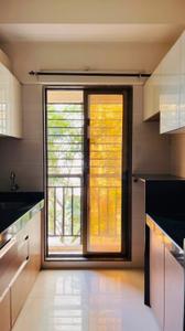 Kitchen Image of 720 Sq.ft 1 BHK Apartment / Flat for rent in Manav Wisteria, Vasai West Vasai for Rs. 18000