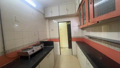 Kitchen Image of 710 Sq.ft 2 BHK Apartment / Flat for rent in Ghatkopar East Mumbai for Rs. 65000