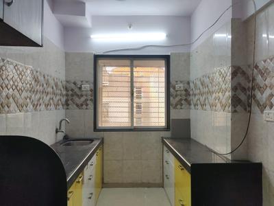 Kitchen Image of 850 Sq.ft 2 BHK Apartment / Flat for sale in Rattan Silicon Park, Malad West Mumbai for Rs. 13800000