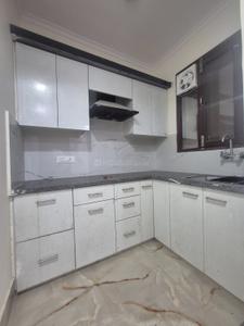 Kitchen Image of 700 Sq.ft 2 BHK Builder Floor for rent in Chhattarpur New Delhi for Rs. 26000