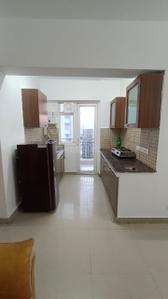 Kitchen Image of 890 Sq.ft 2 BHK Apartment / Flat for rent in Sethi Max Royal, Sector 76 Noida for Rs. 33000