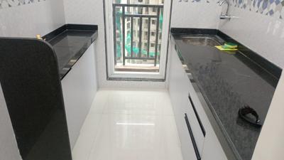 Kitchen Image of 700 Sq.ft 1 BHK Apartment / Flat for rent in Haware Citi, Bharat Nagar Mumbai for Rs. 16211