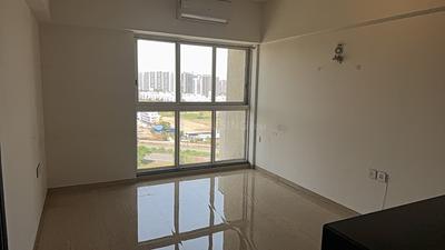 Living Room Image of 650 Sq.ft 1 BHK Studio for sale in Lodha Belmondo, Gahunje Pune for Rs. 6700000