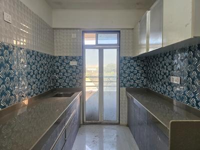 Kitchen Image of 950 Sq.ft 2 BHK Apartment / Flat for rent in Kini Pinnacle, Naigaon East Naigaon for Rs. 16000