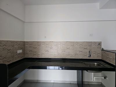 Kitchen Image of 1200 Sq.ft 2 BHK Apartment / Flat for sale in NG Rathi Palmnest G Tower Ultima, Wagholi Pune for Rs. 7300000