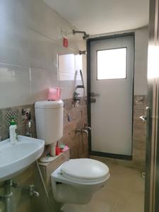 Common Bathroom Image of 600 Sq.ft 1 BHK Apartment / Flat for sale in Puraniks Kanchan Pushp Society, Kasarvadavali Thane for Rs. 5700000