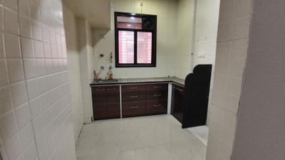 Kitchen Image of 770 Sq.ft 2 BHK Apartment / Flat for sale in Amar Group Amar Vrundavan Complex, Dombivli West Thane for Rs. 6200000