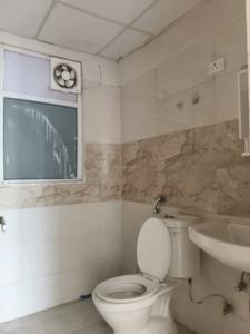 Common Bathroom Image of 945 Sq.ft 2.5 BHK Apartment / Flat for sale in NBCC Golf Homes, Noida Extension Greater Noida for Rs. 7001000