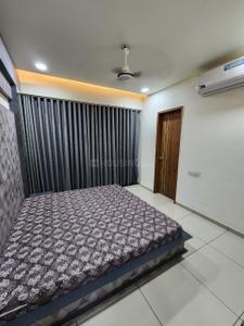 Bedroom Image of 1100 Sq.ft 3 BHK Apartment / Flat for rent in Shambhu Savan Signet, Radhika Park Rajkot for Rs. 34000