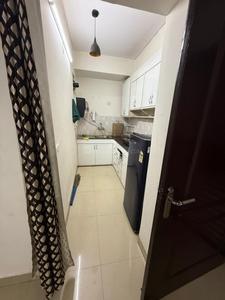 Kitchen Image of 881 Sq.ft 2 BHK Apartment / Flat for rent in Aditya City Apartment Ghaziabad, Wave City Ghaziabad for Rs. 22000