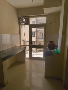 Kitchen Image of 680 Sq.ft 2 BHK Apartment / Flat for rent in Adani Aangan, Sector 89A Gurgaon for Rs. 14000