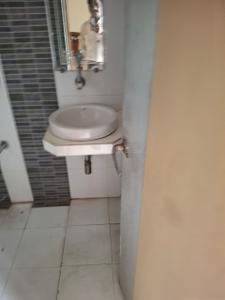 Bathroom Image of 610 Sq.ft 2 BHK Apartment / Flat for rent in Akshar Green World, Dighe Thane for Rs. 67000