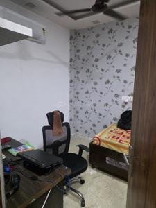 Bedroom Image of 700 Sq.ft 2 BHK Builder Floor for rent in Sector 11 Rohini New Delhi for Rs. 20000