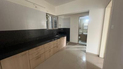 Kitchen Image of 900 Sq.ft 2 BHK Apartment / Flat for sale in Kothrud Pune for Rs. 10600000