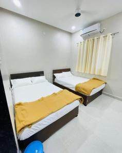 Bedroom Image of Royal pg Accommodation in Prahlad Nagar, Ahmedabad