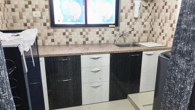 Kitchen Image of 650 Sq.ft 1 BHK Apartment / Flat for rent in Signature Vrajdham, Ujala Circle Ahmedabad for Rs. 18000