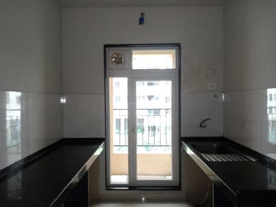 Kitchen Image of 711 Sq.ft 2 BHK Apartment / Flat for sale in Rustomjee Azziano Wing F, Thane West Thane for Rs. 14500000