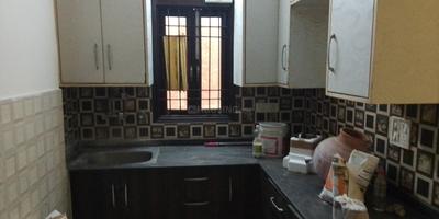 Kitchen Image of 900 Sq.ft 2 BHK Builder Floor for rent in Ramesh Nagar New Delhi for Rs. 24000