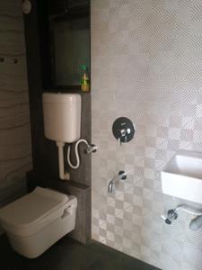Common Bathroom Image of 710 Sq.ft 1 BHK Apartment / Flat for sale in Gopal Krishna Krishna Paradise, Kalyan East Kalyan for Rs. 4200000