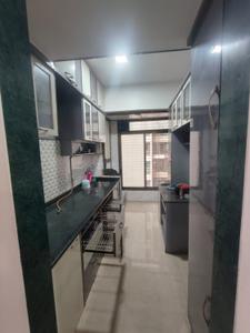 Kitchen Image of 900 Sq.ft 2 BHK Apartment / Flat for rent in Mohan Willows, Badlapur East Badlapur for Rs. 15000