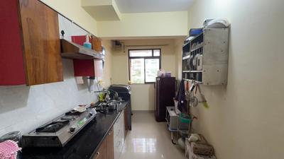 Kitchen Image of 624 Sq.ft 1 BHK Apartment / Flat for sale in Puraniks Home Town, Kasarvadavali Thane for Rs. 6100000