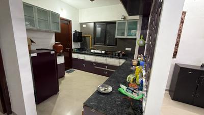 Kitchen Image of 1250 Sq.ft 2 BHK Apartment / Flat for rent in Savvy Swaraaj Pragati PH 2 2A, Gota Ahmedabad for Rs. 21000