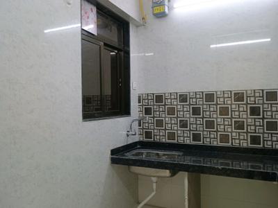Kitchen Image of 920 Sq.ft 2 BHK Apartment / Flat for sale in Mohan Willows, Badlapur East Badlapur for Rs. 4100000