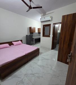 Bedroom Image of 450 Sq.ft 1 RK Studio for rent in Sector 10A Gurgaon for Rs. 17000