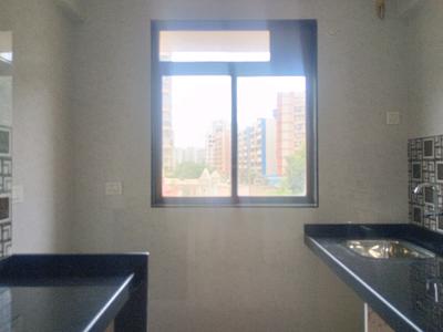 Kitchen Image of 673 Sq.ft 1 BHK Apartment / Flat for sale in Raj Urbania, Ambernath East Ambernath for Rs. 2500000