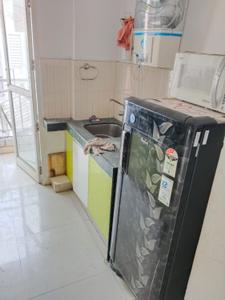 Kitchen Image of 600 Sq.ft 1 BHK Apartment / Flat for rent in Godrej Garden City, Gota Ahmedabad for Rs. 21000