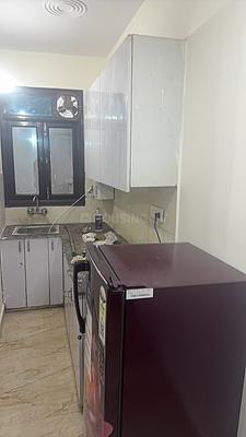 Kitchen Image of 420 Sq.ft 1 BHK Builder Floor for rent in Rajpur Khurd Village New Delhi for Rs. 25000