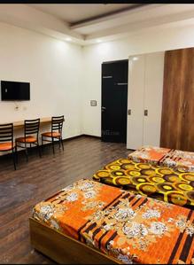 Bedroom Image of SUNSINE GIRLS PG  in Sector 16A, Noida