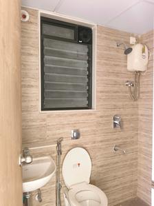 Common Bathroom Image of 680 Sq.ft 1 BHK Apartment / Flat for sale in Lodha Palava Premier, Dombivli East Thane for Rs. 4500000